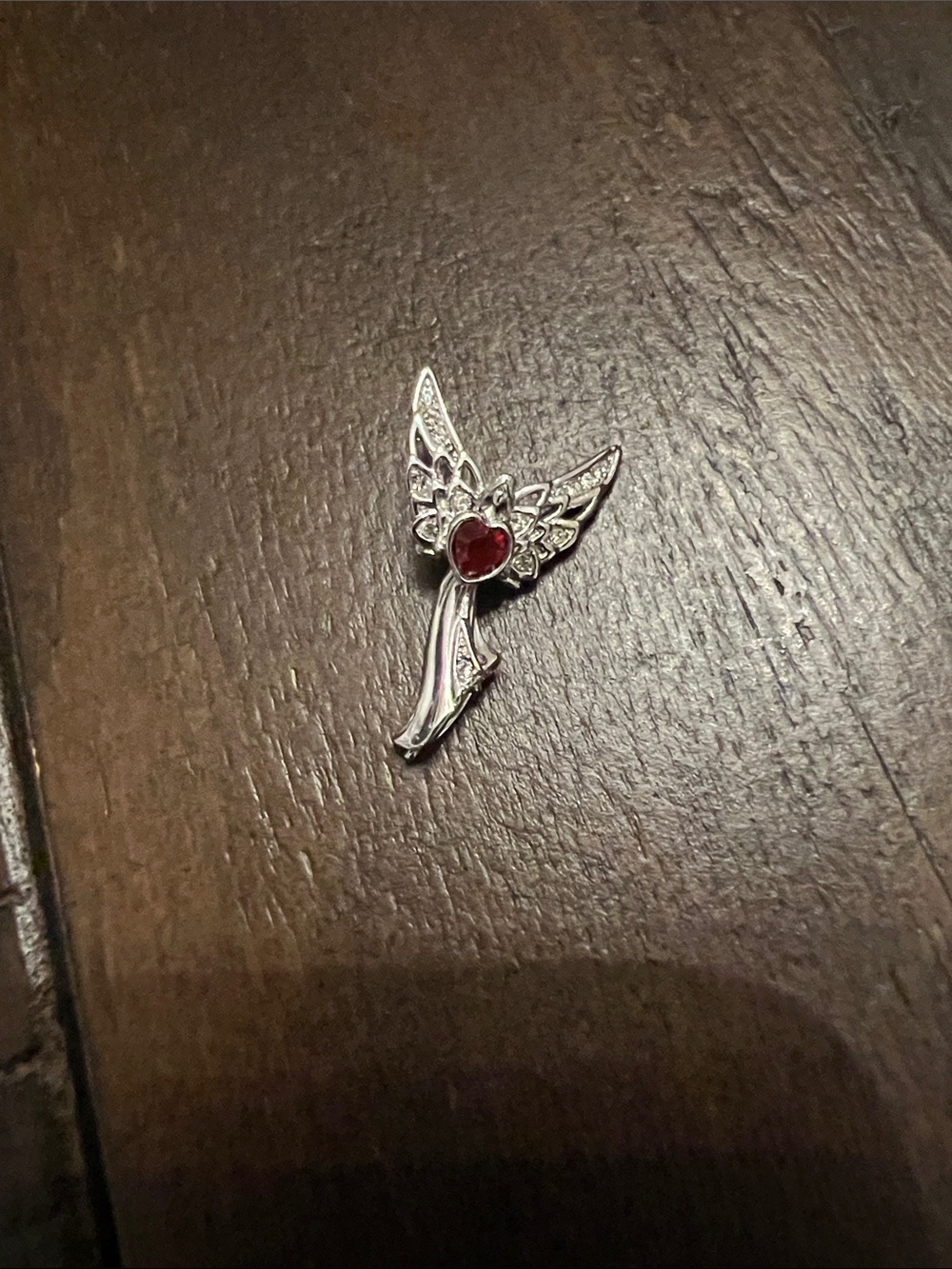 Silver Angel Wing Pendant with Red Heart Gem